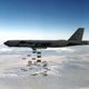 B-52 bomber unloading conventional bombs on a target, location and date unknown.